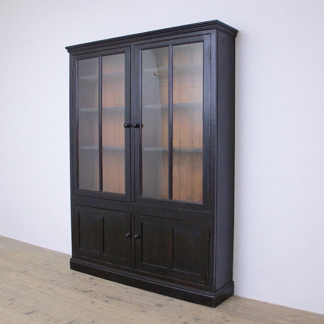 A C19th ebonised cabinet