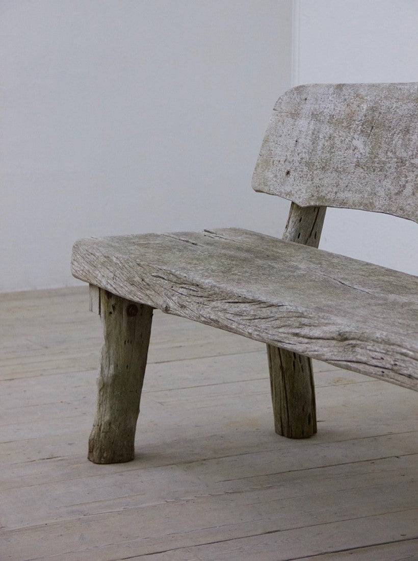A rustic oak bench