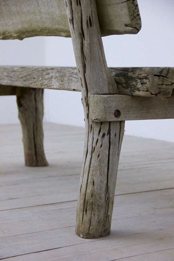 A rustic oak bench