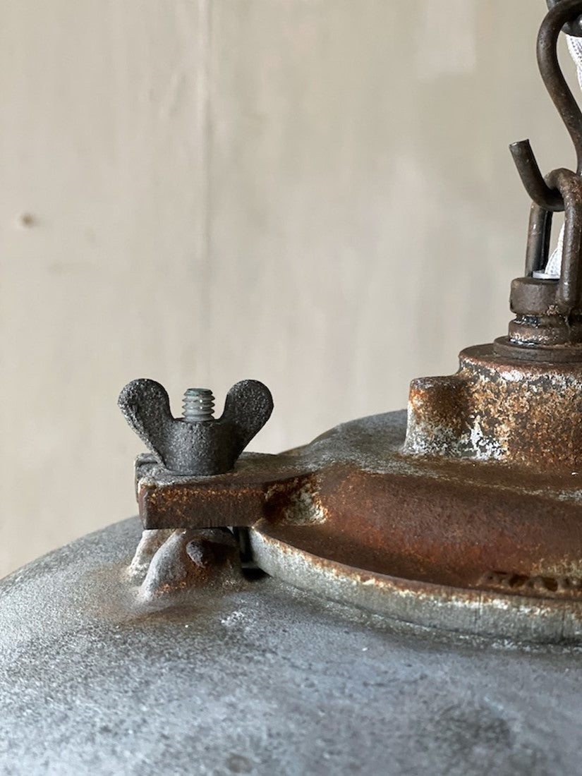 A 1930s iron pendant light