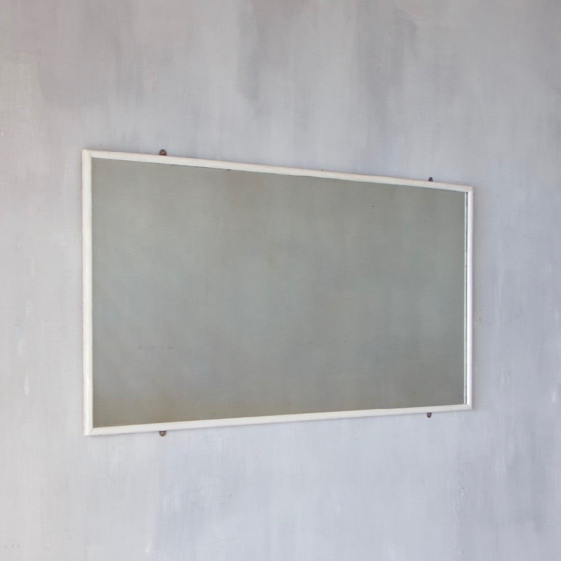 An early 20th century shop mirror