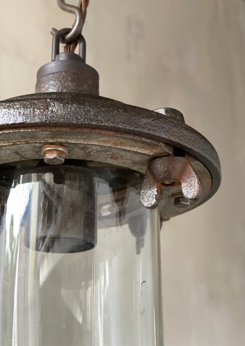 An industrial iron pendant light