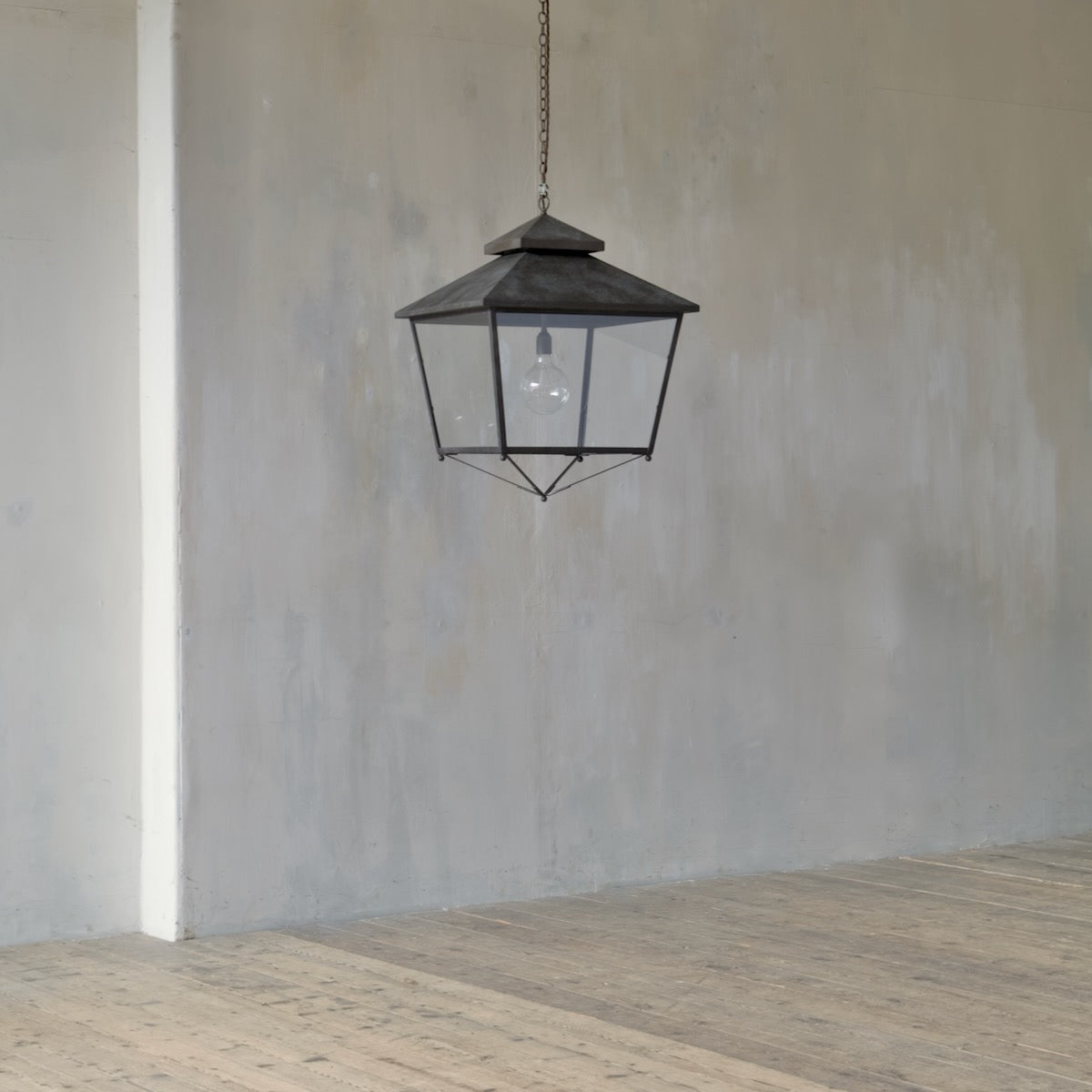 An elegant custom brass galley lantern