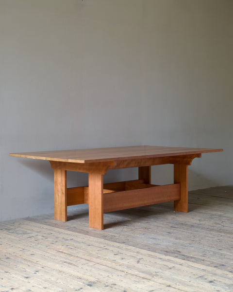A Martello dining table in American black cherry