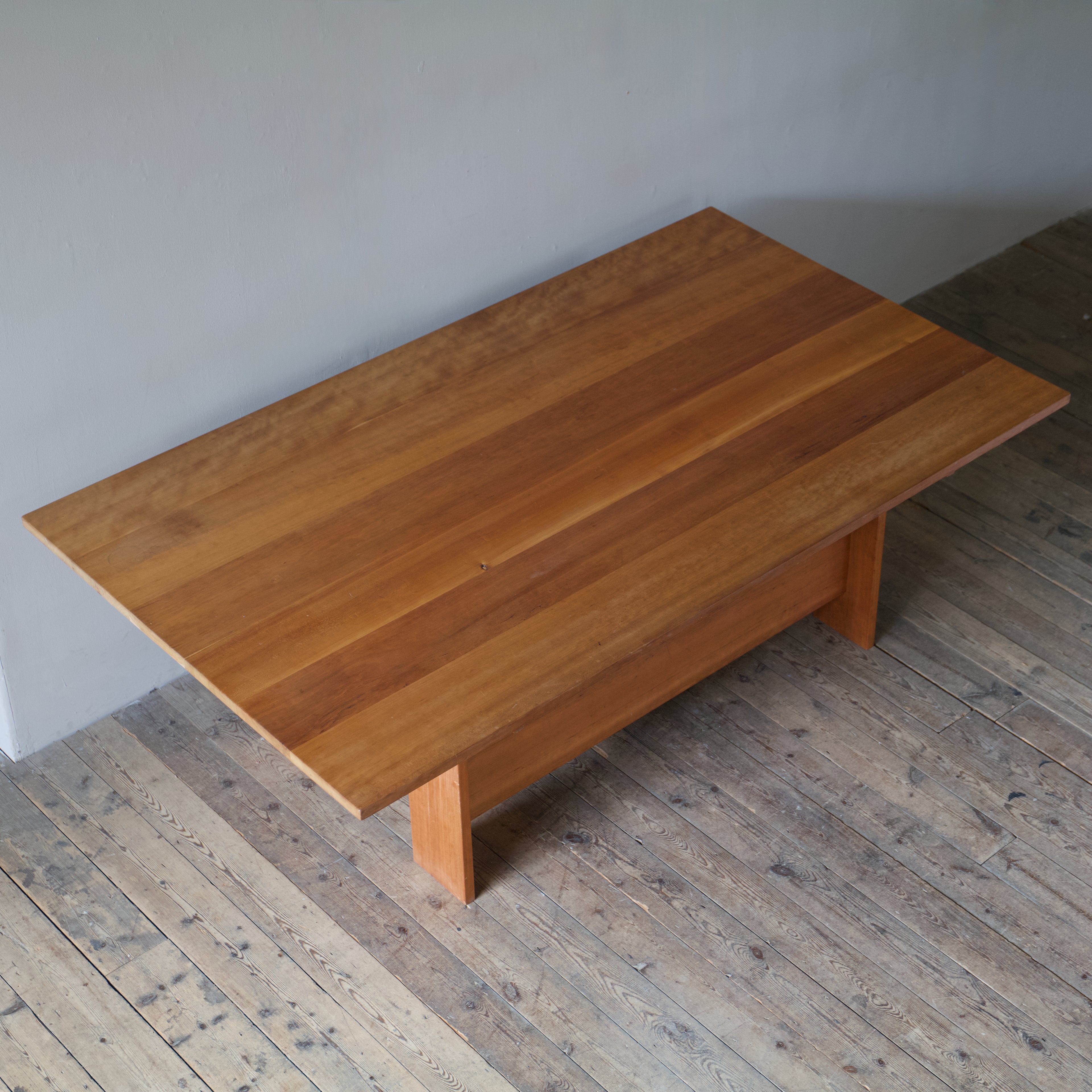 A Martello dining table in American black cherry