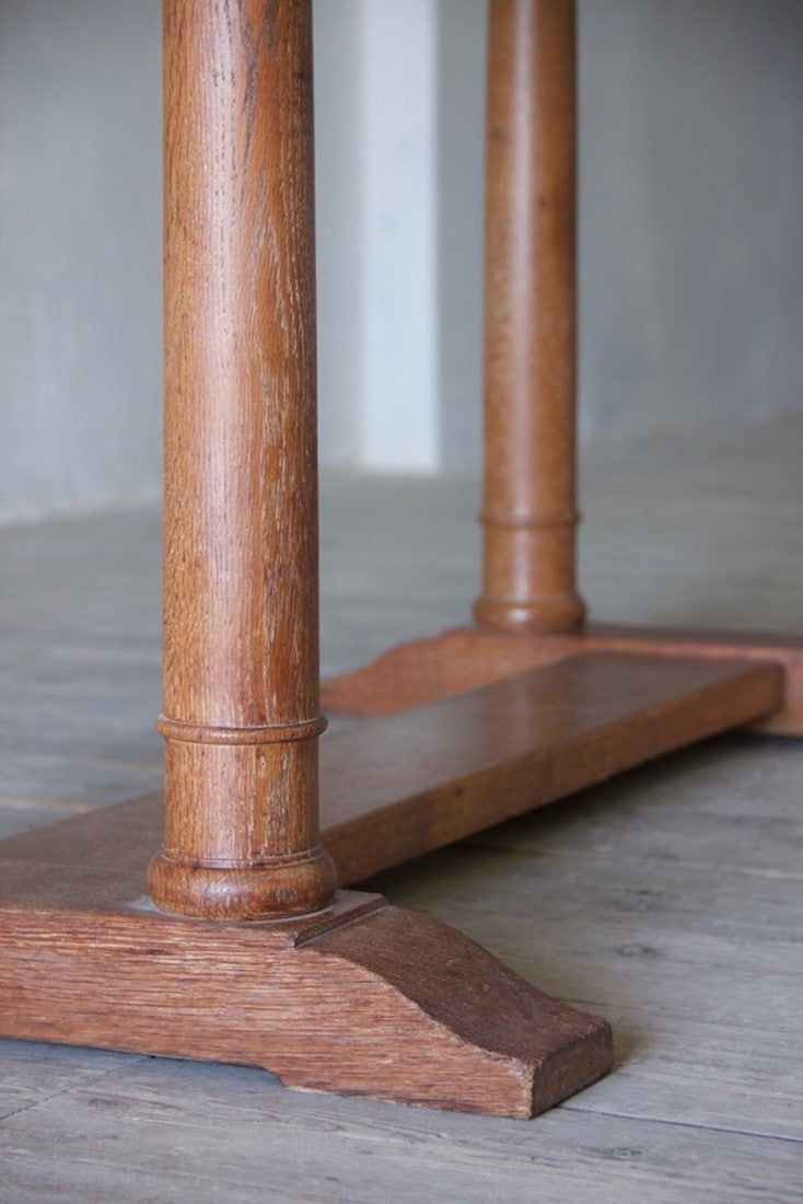 A Heal & Sons oak dining table c.1922