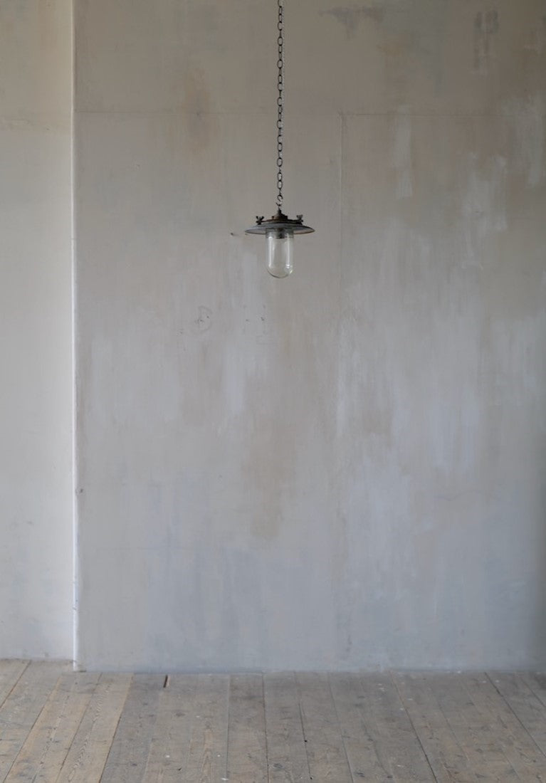 A 1930s iron pendant light