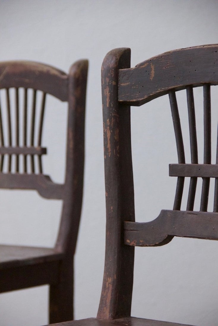 A pair of primitive Irish chairs