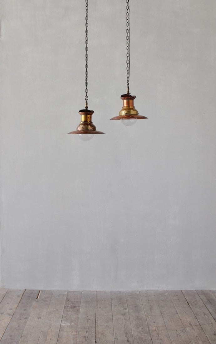 A pair of small copper station lights
