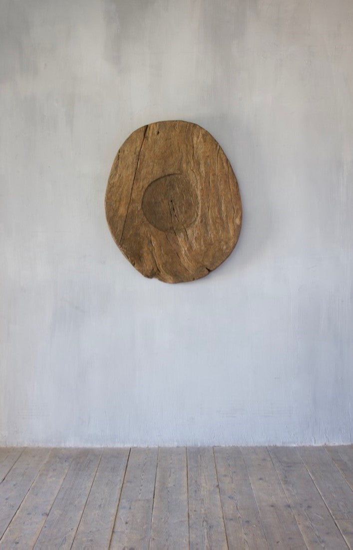 A very large wooden plate
