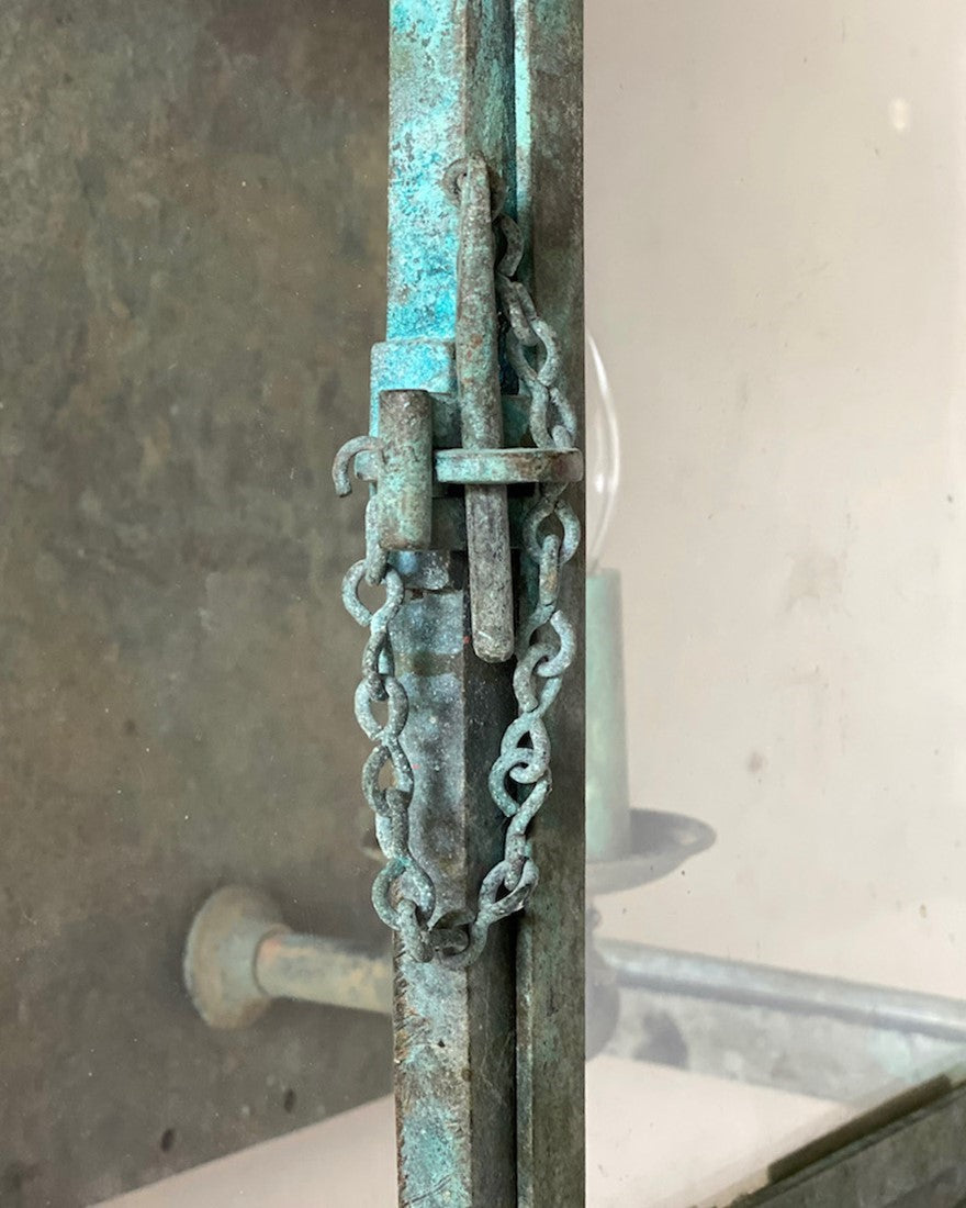 A verdigris bronze wall lantern