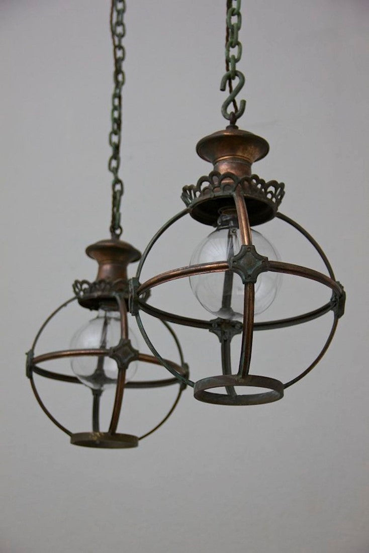 A pair of copper globe lanterns