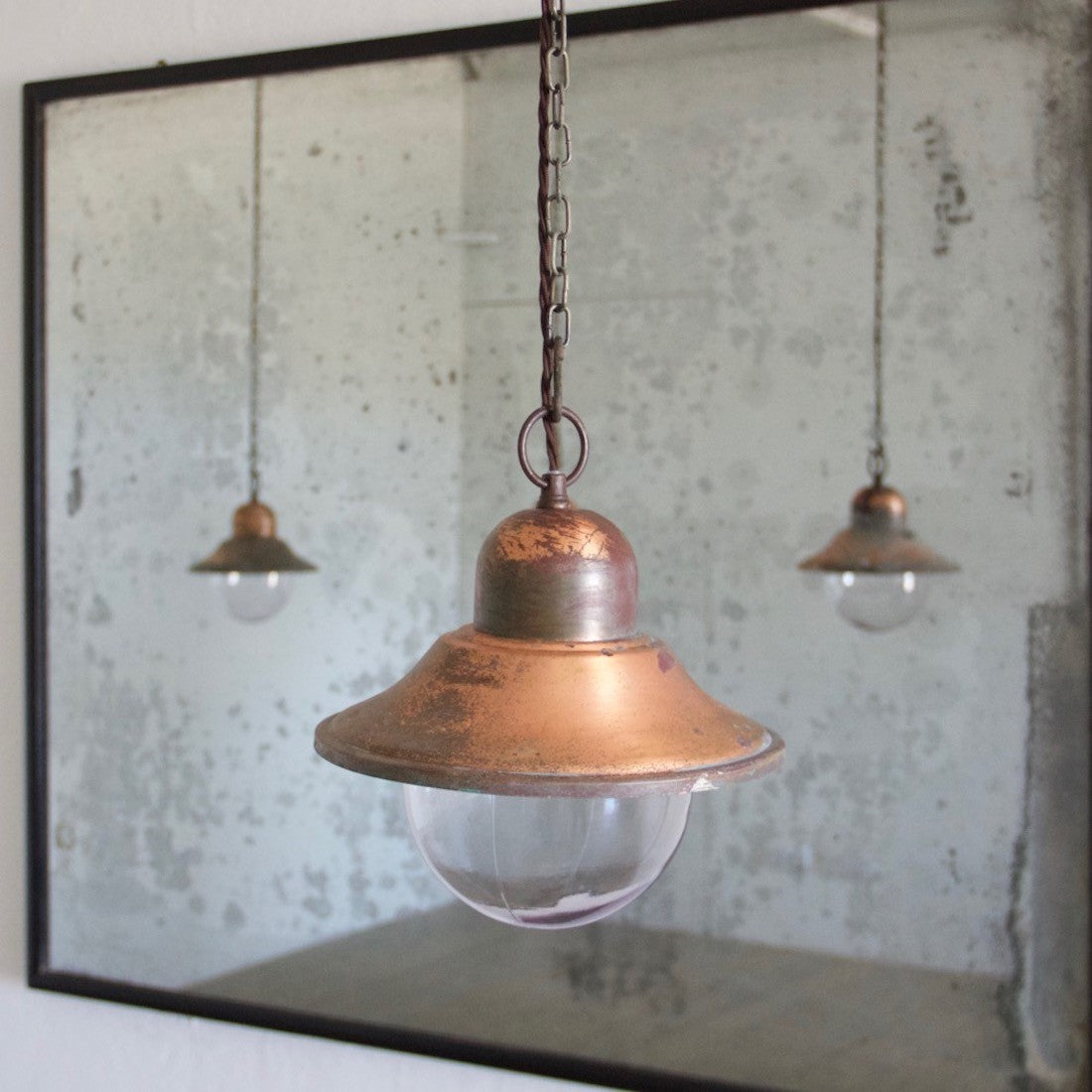 A set of 5 copper pendant lights
