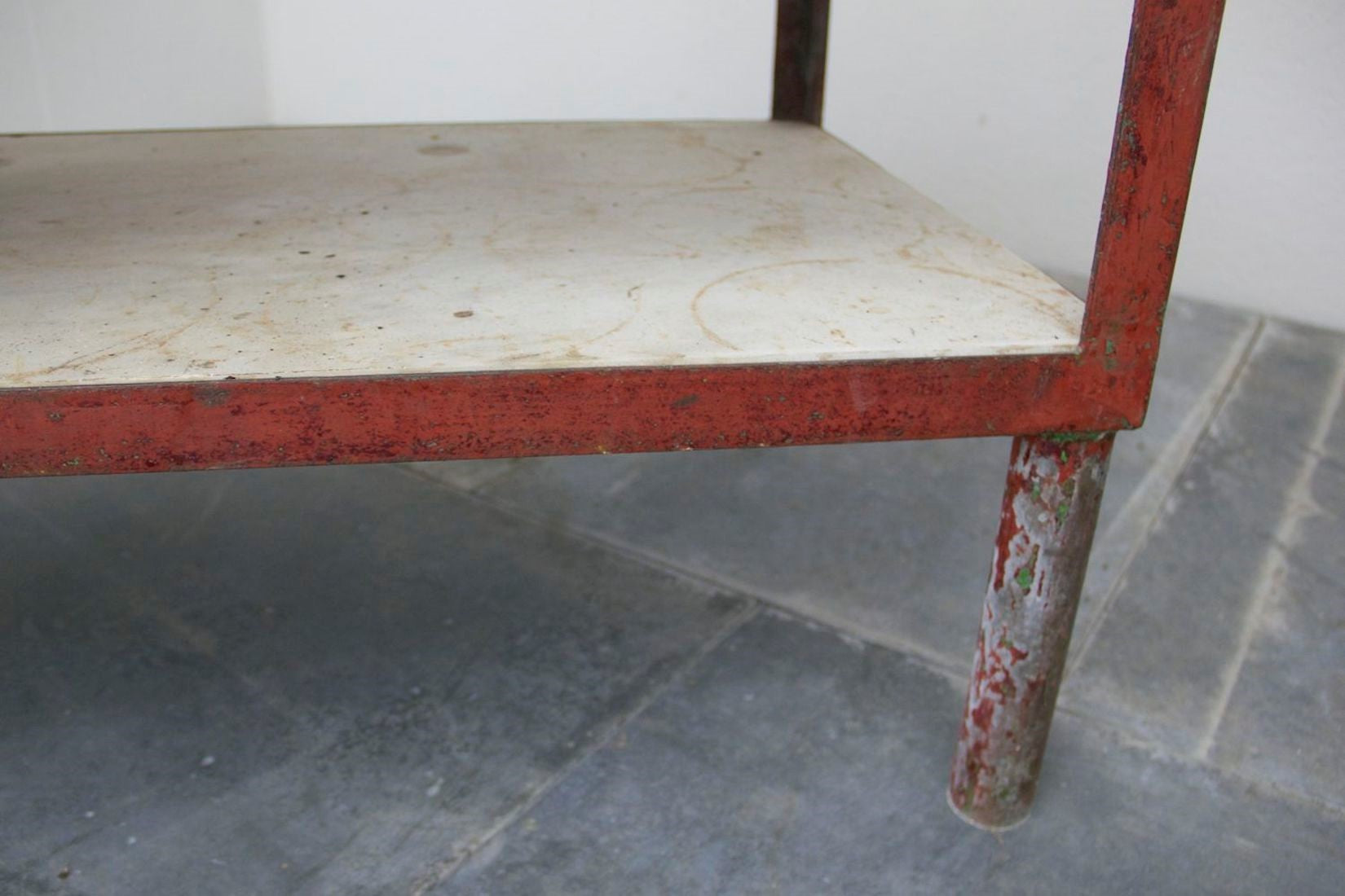 An early C20th iron and marble table