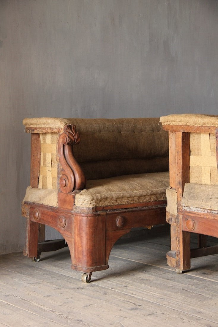 A pair of 19th century sofas from Penrhyn castle, Wales