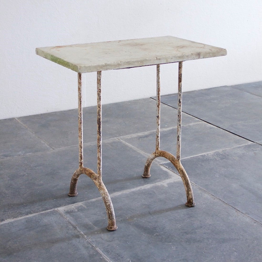 A 1920s side table with marble top