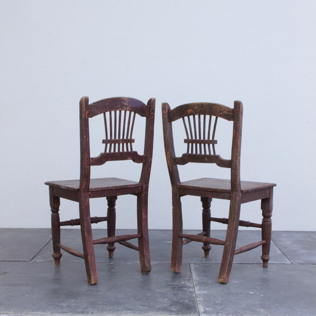 A pair of primitive Irish chairs