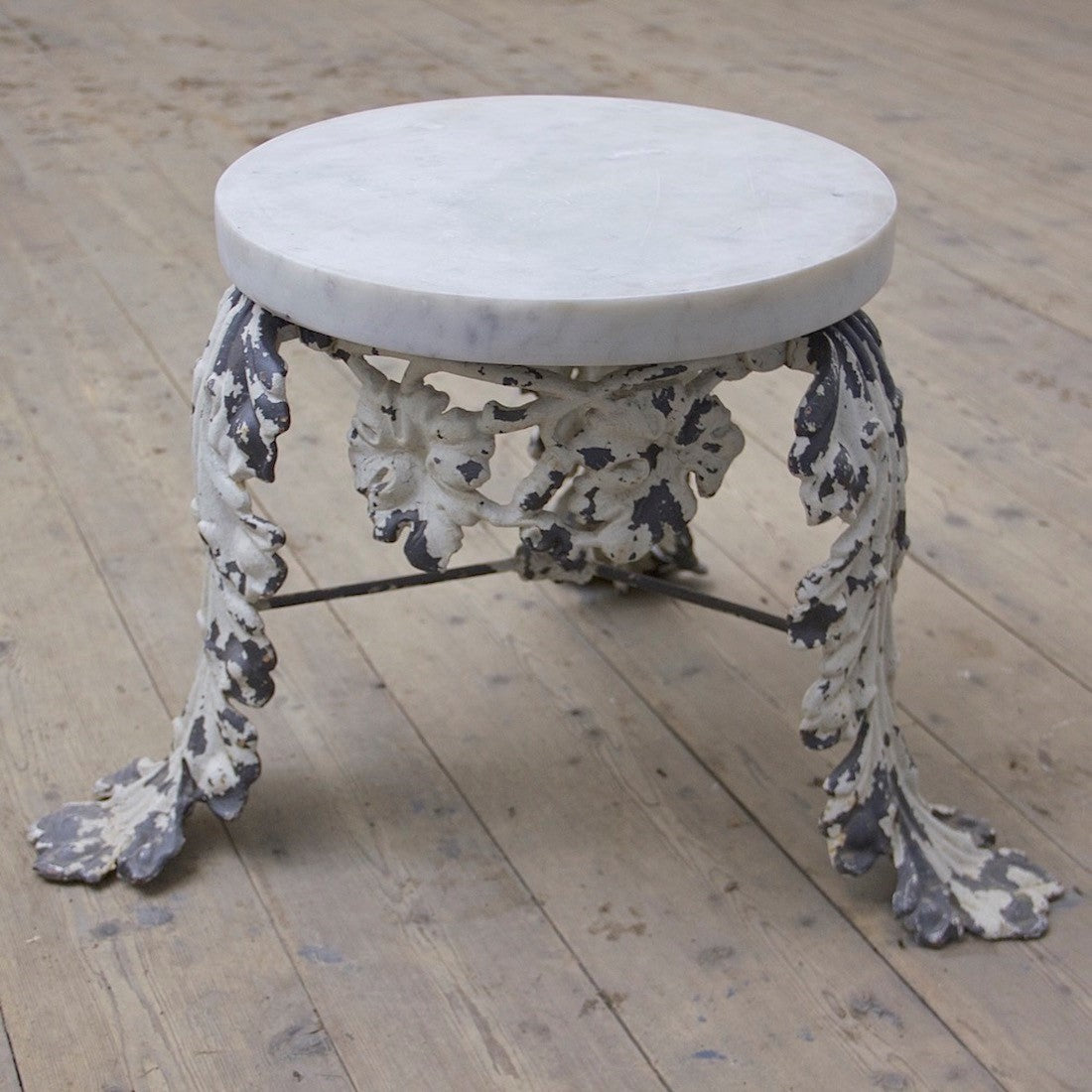 A C19th iron and marble side table