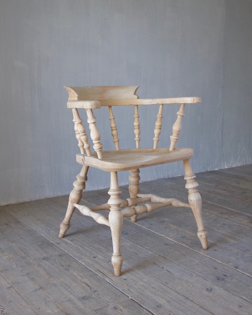 A set of 8 captain's chairs