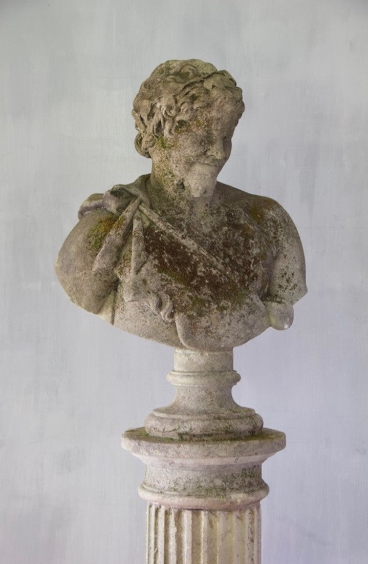 Two classical busts on columns