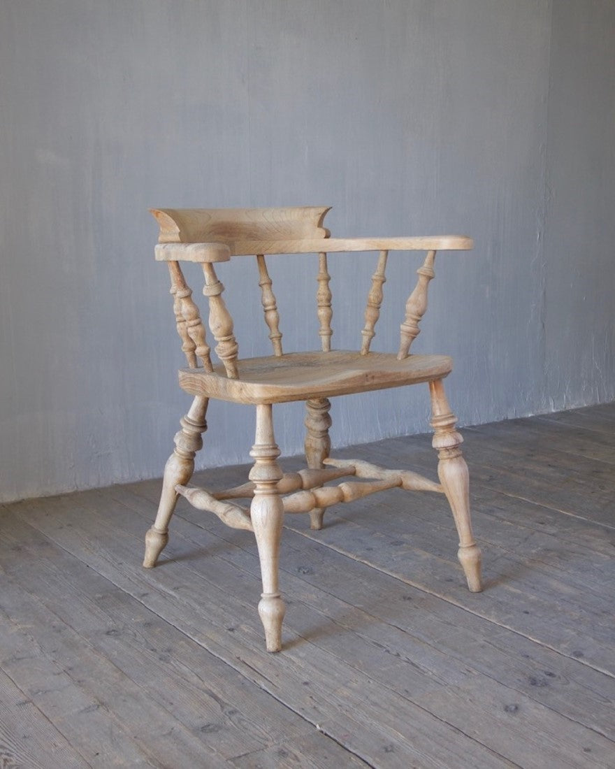 A set of 8 captain's chairs