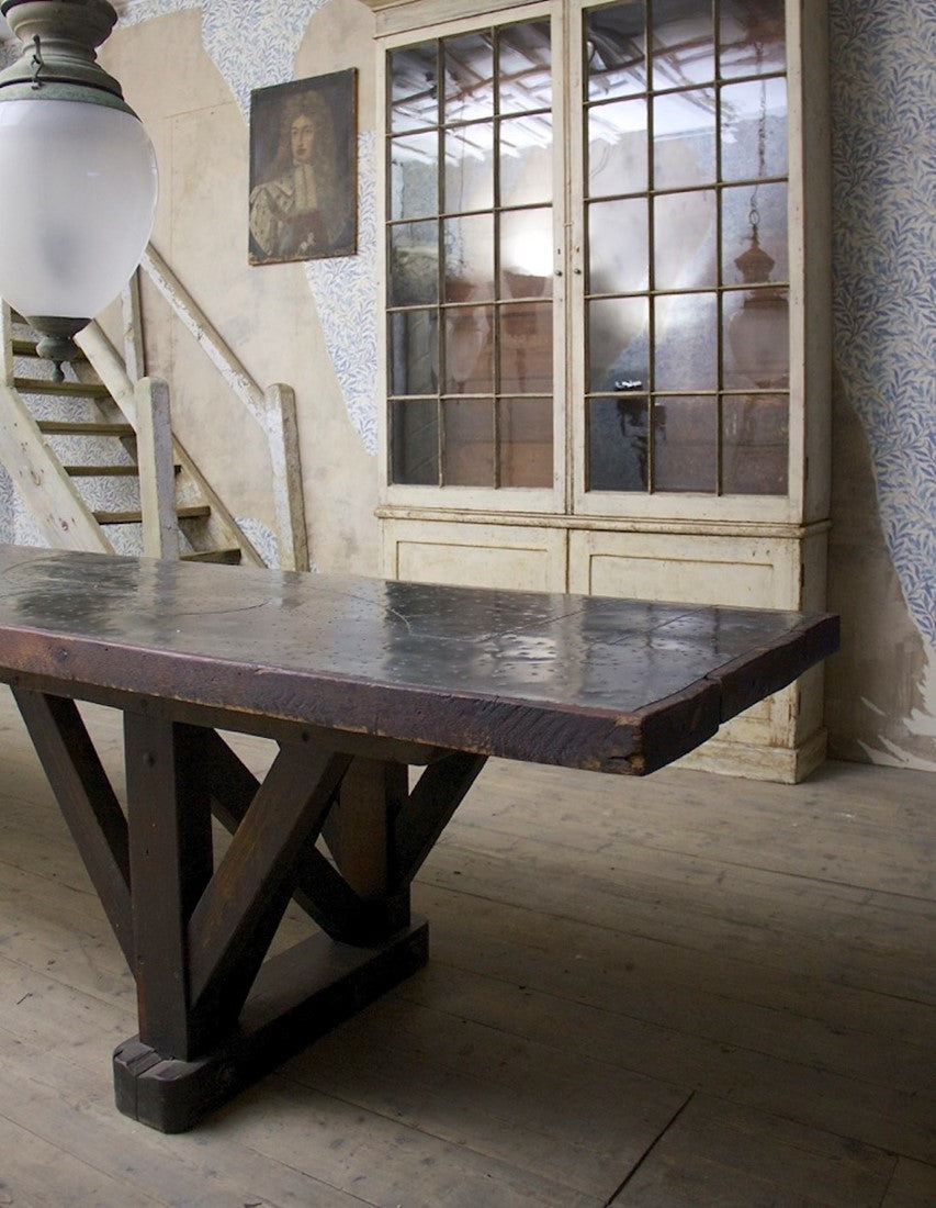 An architectural C19th work table with a patchwork zinc top
