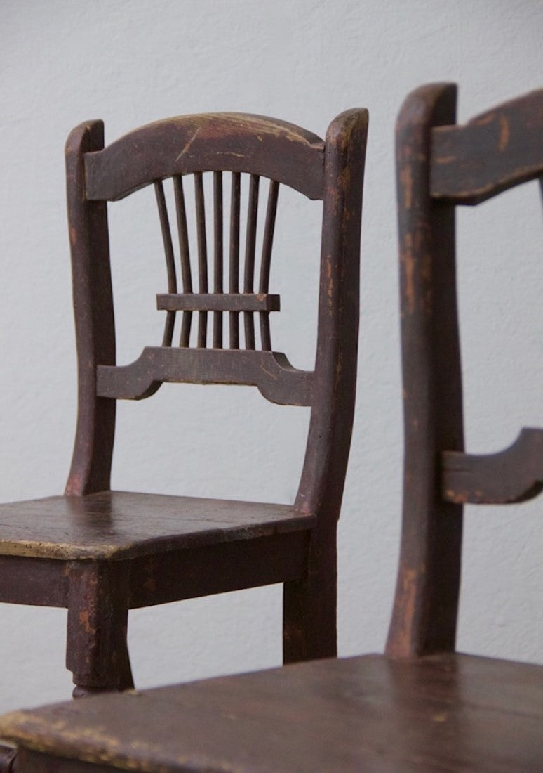 A pair of primitive Irish chairs