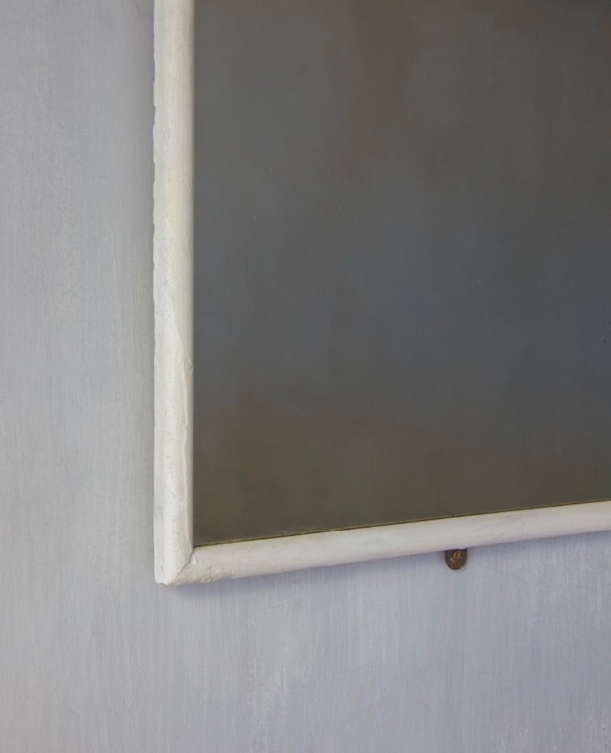 An early 20th century shop mirror
