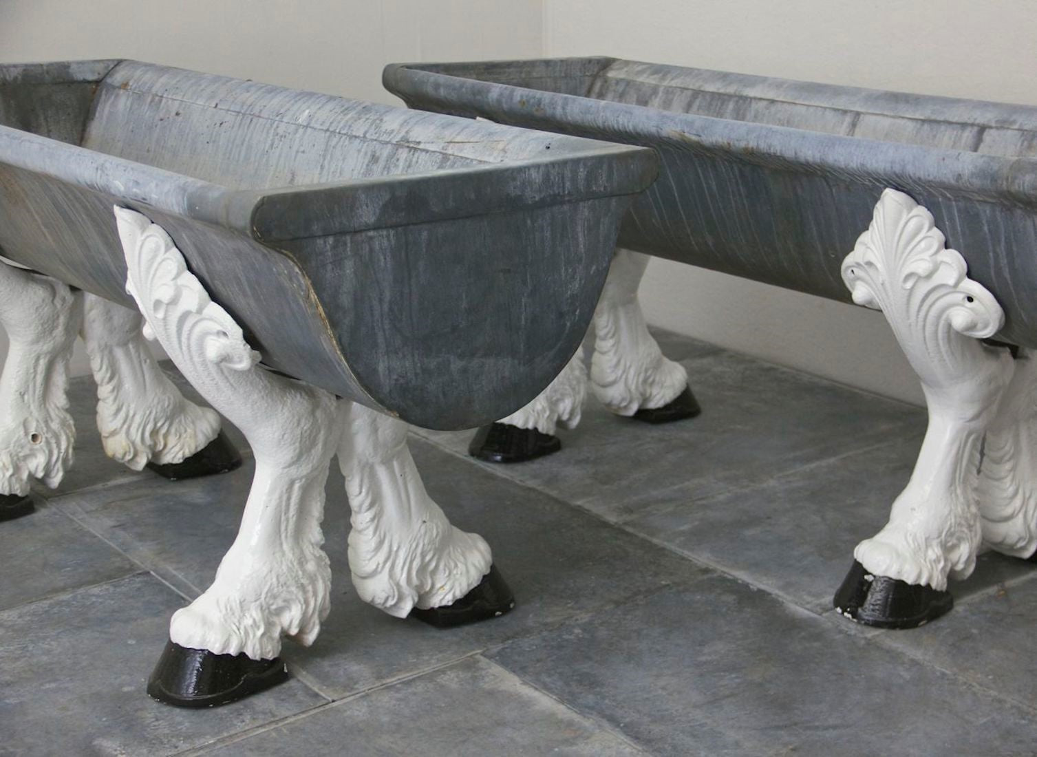 A pair of c19th drinking troughs