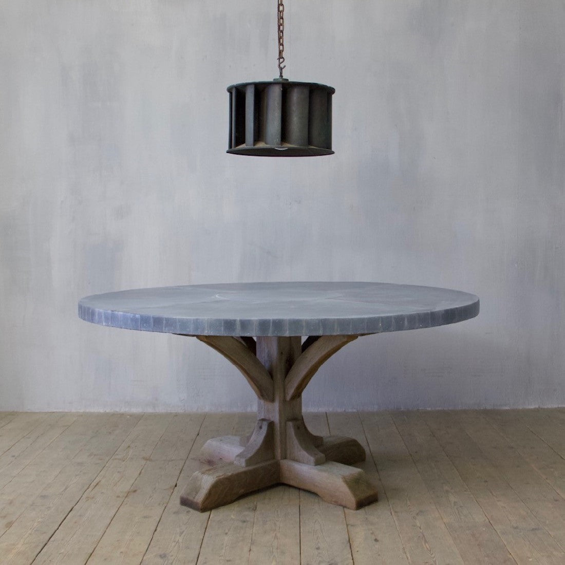 A pair of industrial copper pendant lights