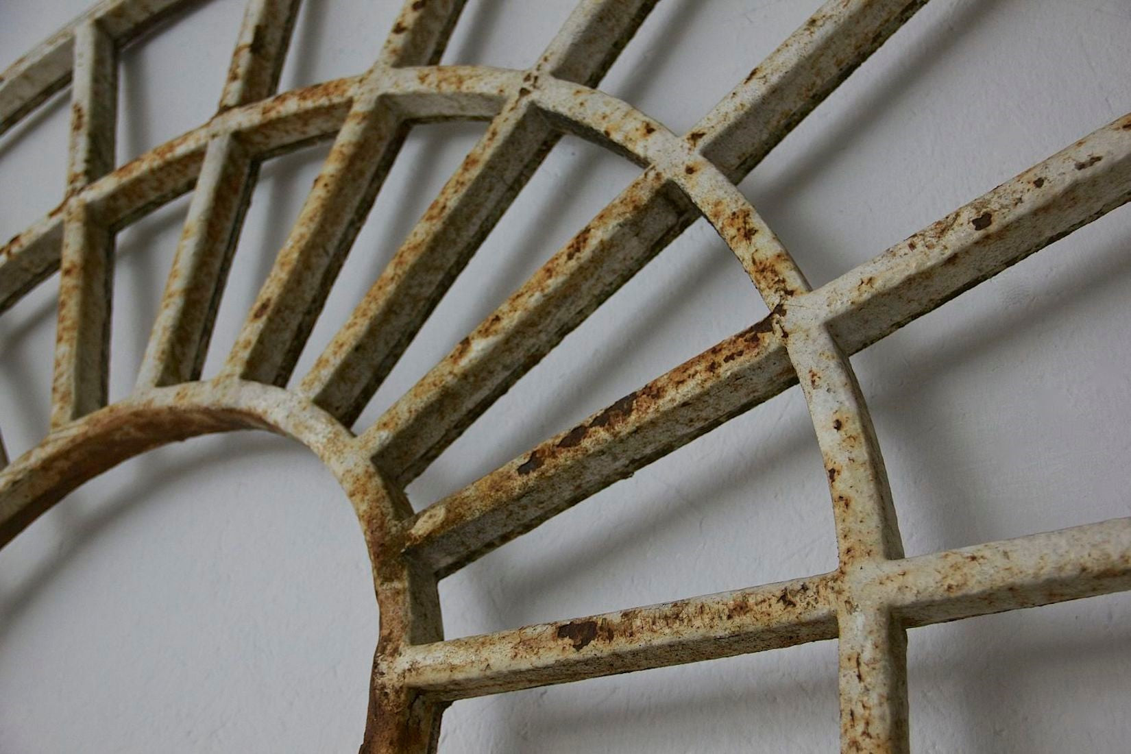 A large pair of C19th arched iron frames