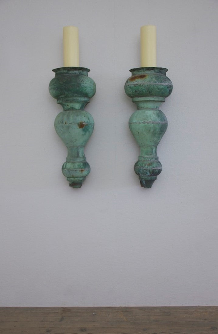 A pair of C19th copper torcheres
