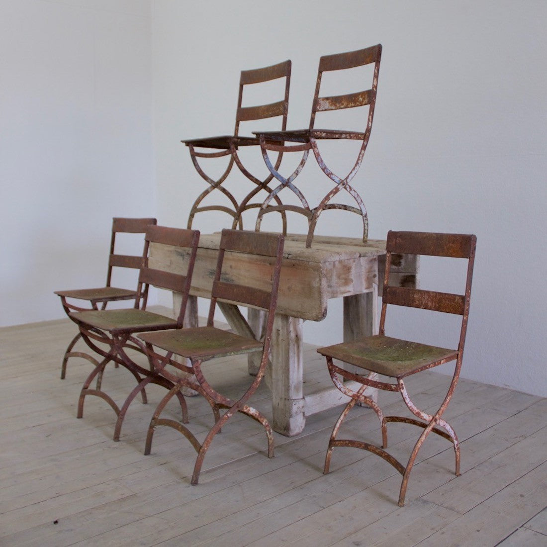 A set of six iron chairs