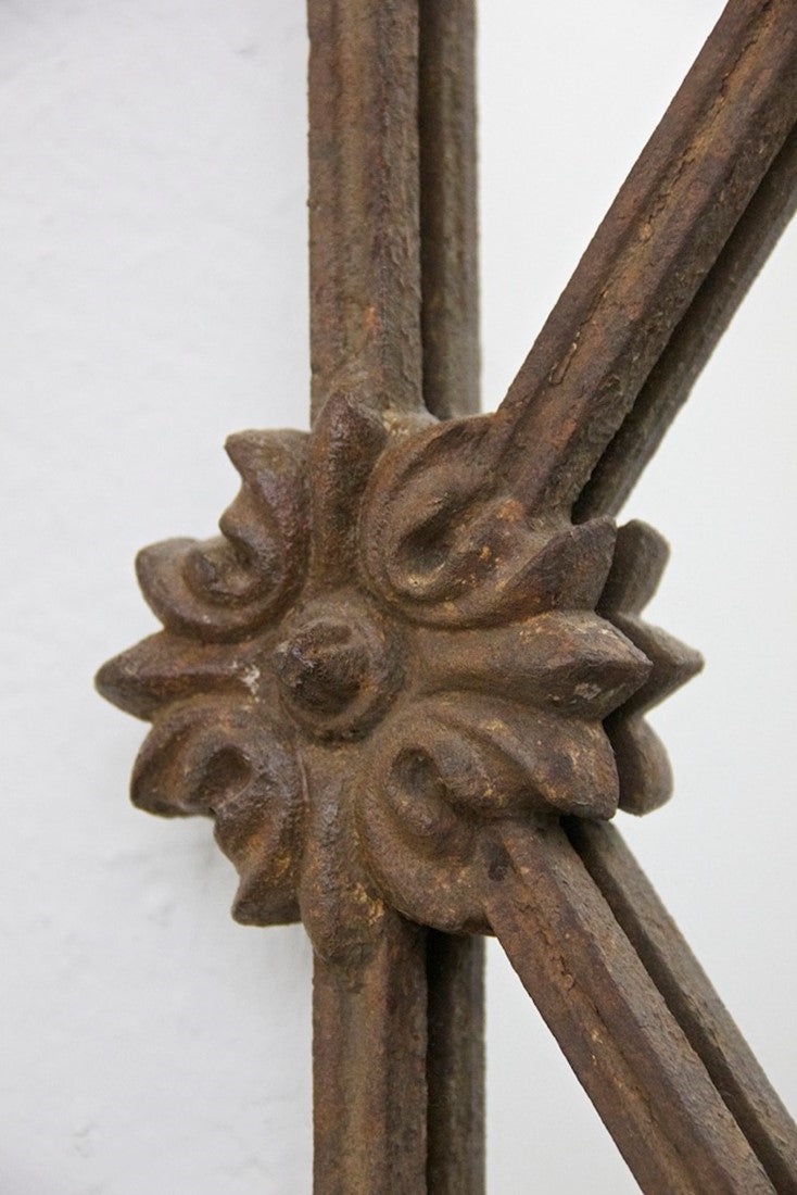 A C19th iron framed mirror.