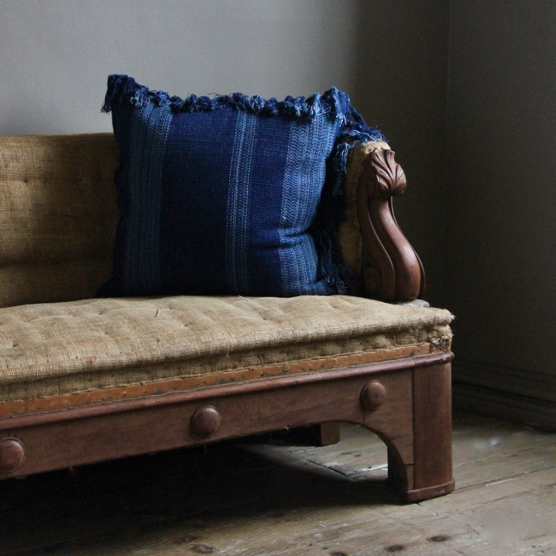 A pair of 19th century sofas from Penrhyn castle, Wales