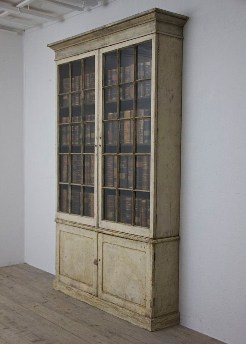 A C19th glazed library bookcase. England c1840