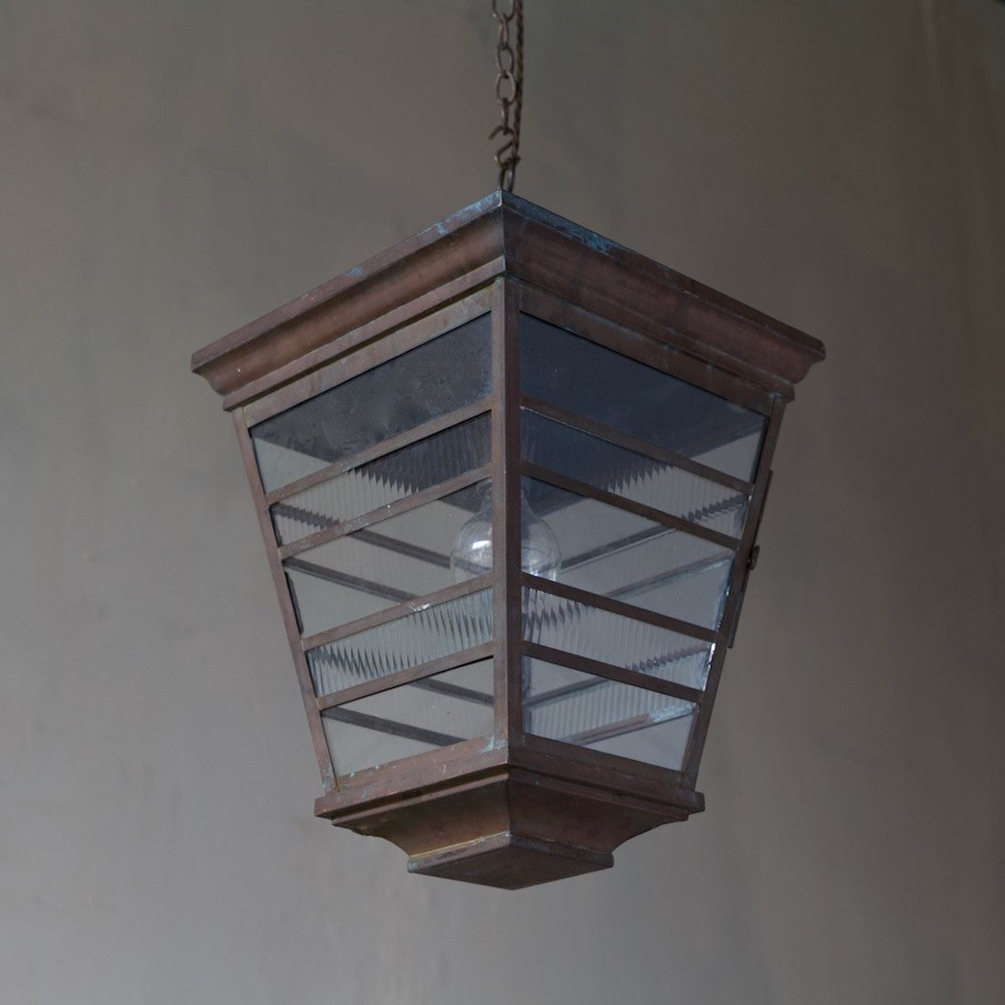 A bold 1930s copper lantern (one of a pair)