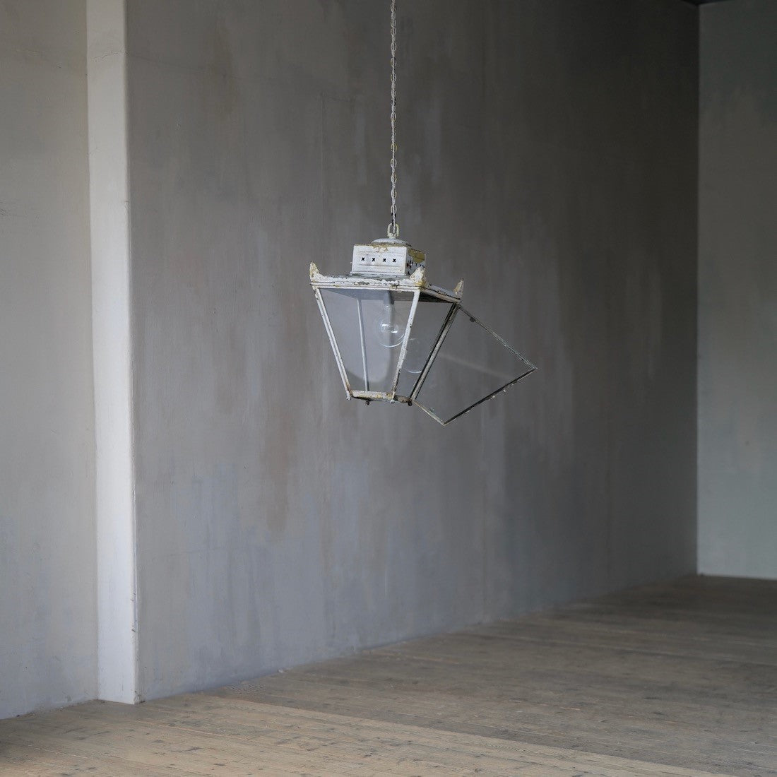 A large 1920s square copper lantern