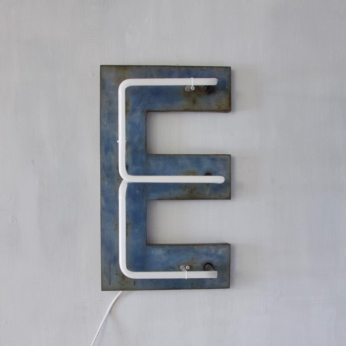 An original 1930's neon E