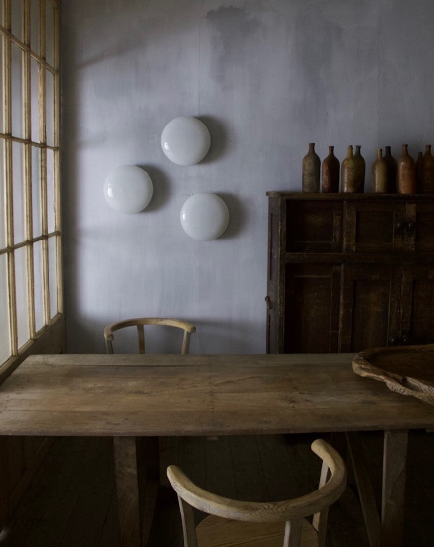 A set of three opaline lights