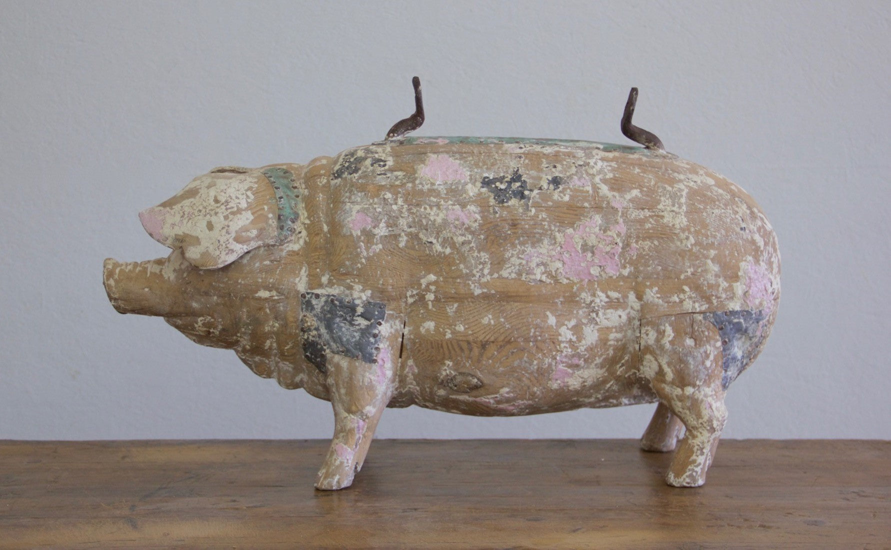 A carved wood butcher's sign