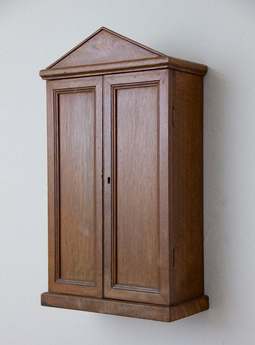 An early C20th key cupboard