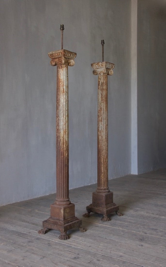 A pair of architectural column lamps