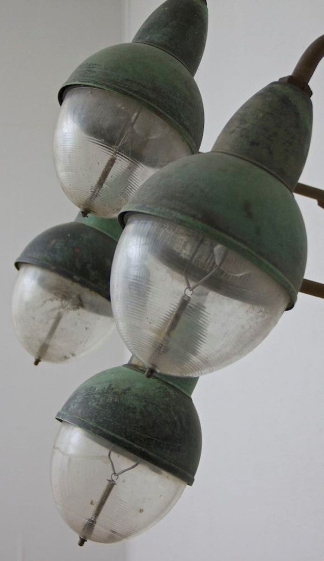 A run of 10 Holophane wall lights