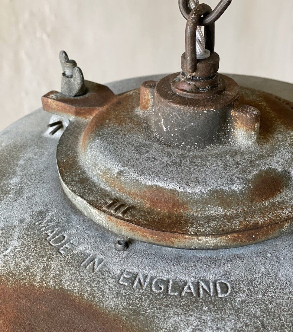 A 1930s iron pendant light