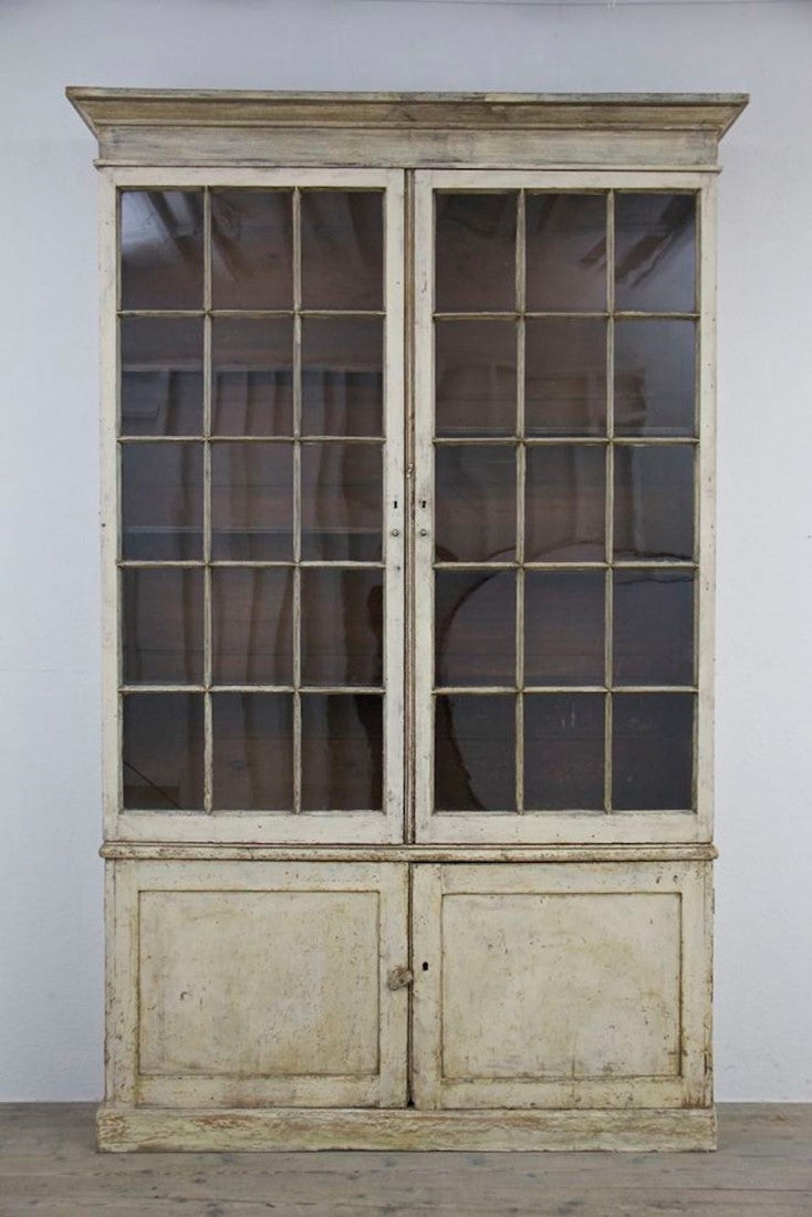 A C19th glazed library bookcase. England c1840