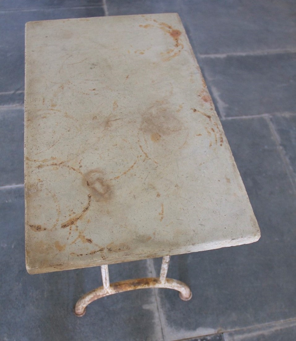 A 1920s side table with marble top