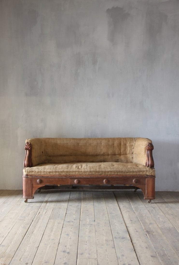 A pair of 19th century sofas from Penrhyn castle, Wales