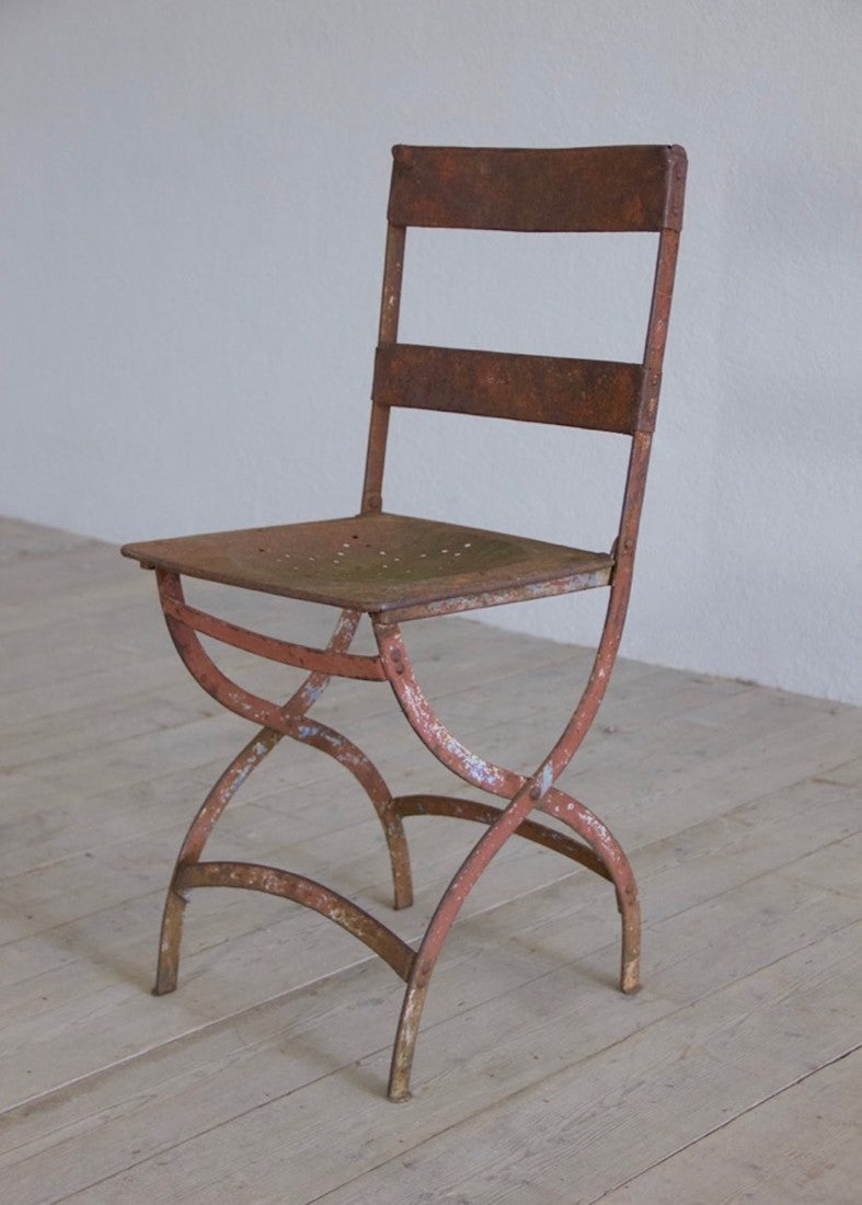 A set of six iron chairs