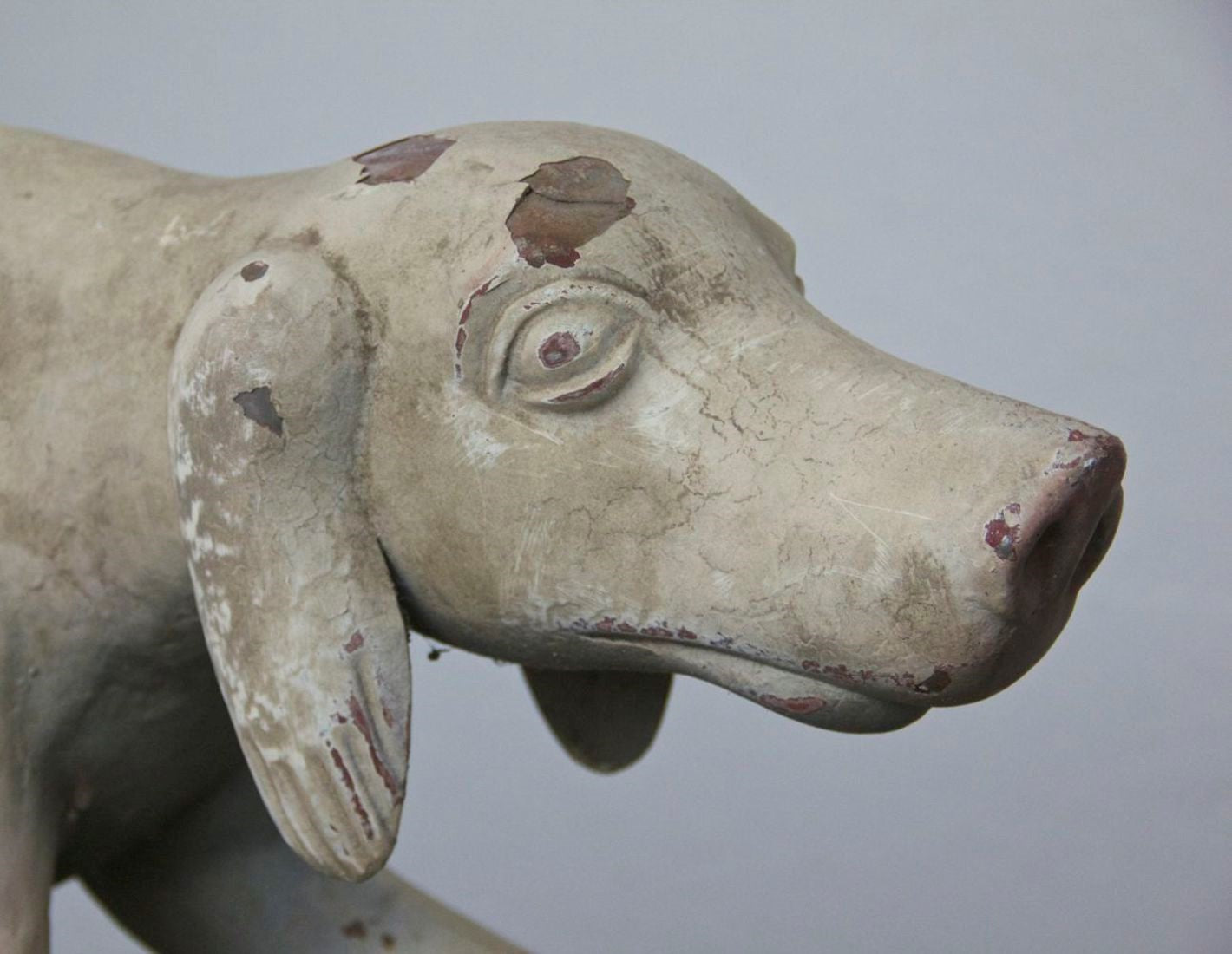 A primitive tin hunting dog